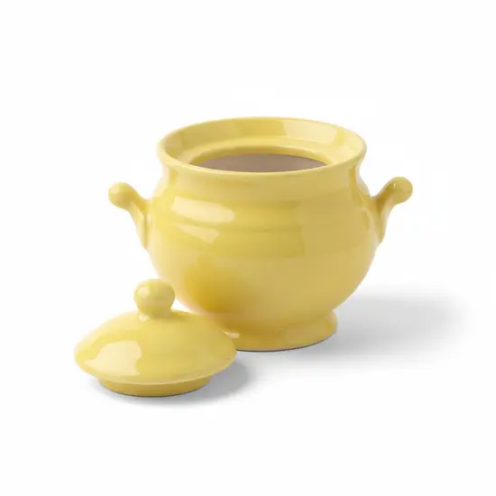 צנצנת קרמיקה עם מכסה בעבודת יד ונפח של 600 מ"ל , בצבע צהוב